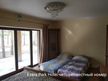 Фото номера Классический четырехместный номер Загородные дома Ezera Park Hotel г. Pogost-Zagorodskiy 3